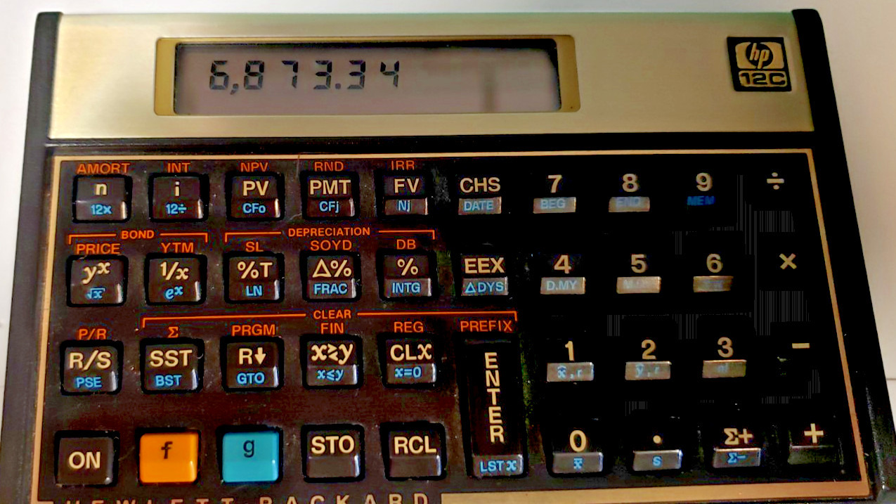 HP 12C Financial Calculator with original HP leather slip case Tested HP 12C Financial Calculator with original HP leather slip case Tested