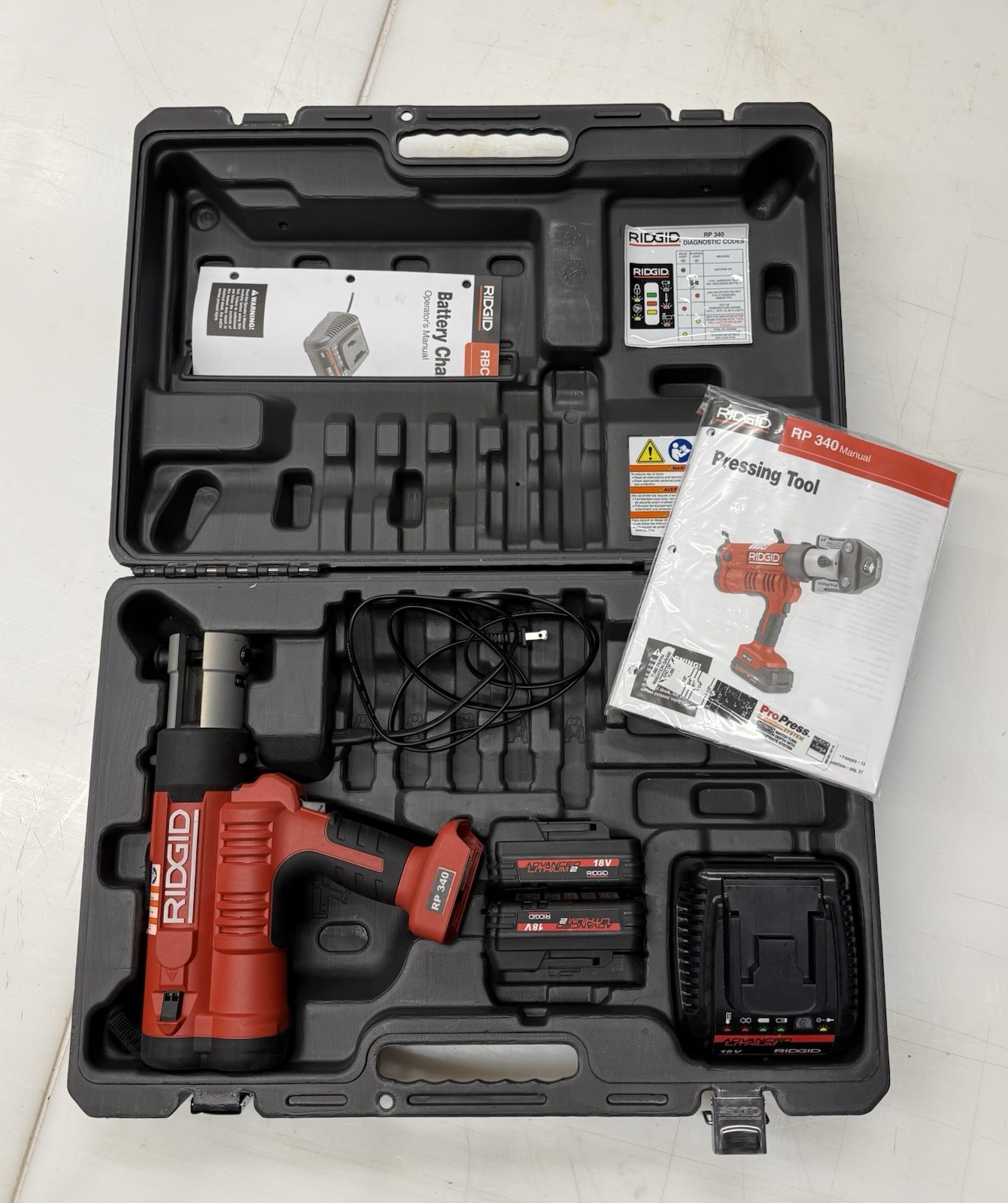Ridgid Model RP340 Propress Crimper with batteries charger case NO JAWS INCLUDED
