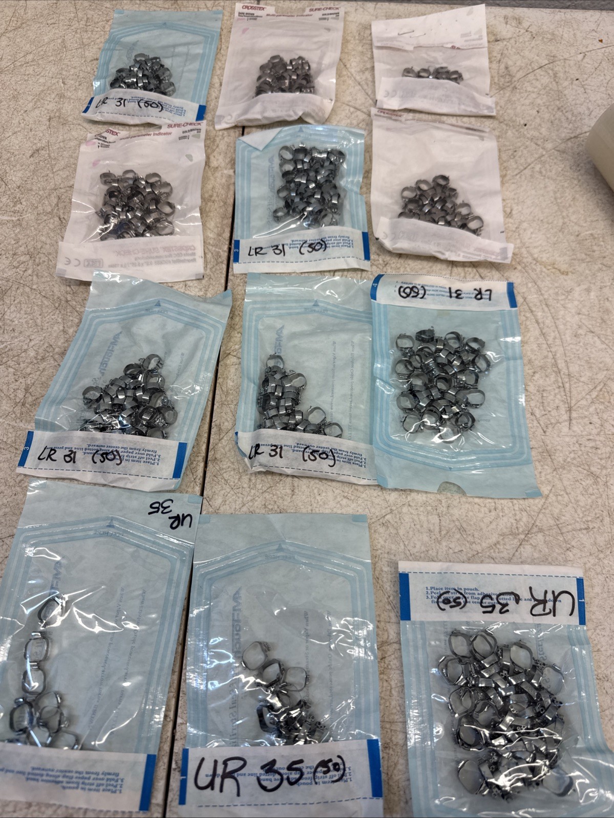 Lot Of (12) Molar Bands. Dental, Stainless, Various Sizes 300+ Count Lot Of (12) Molar Bands. Dental, Stainless, Various Sizes 300+ Count