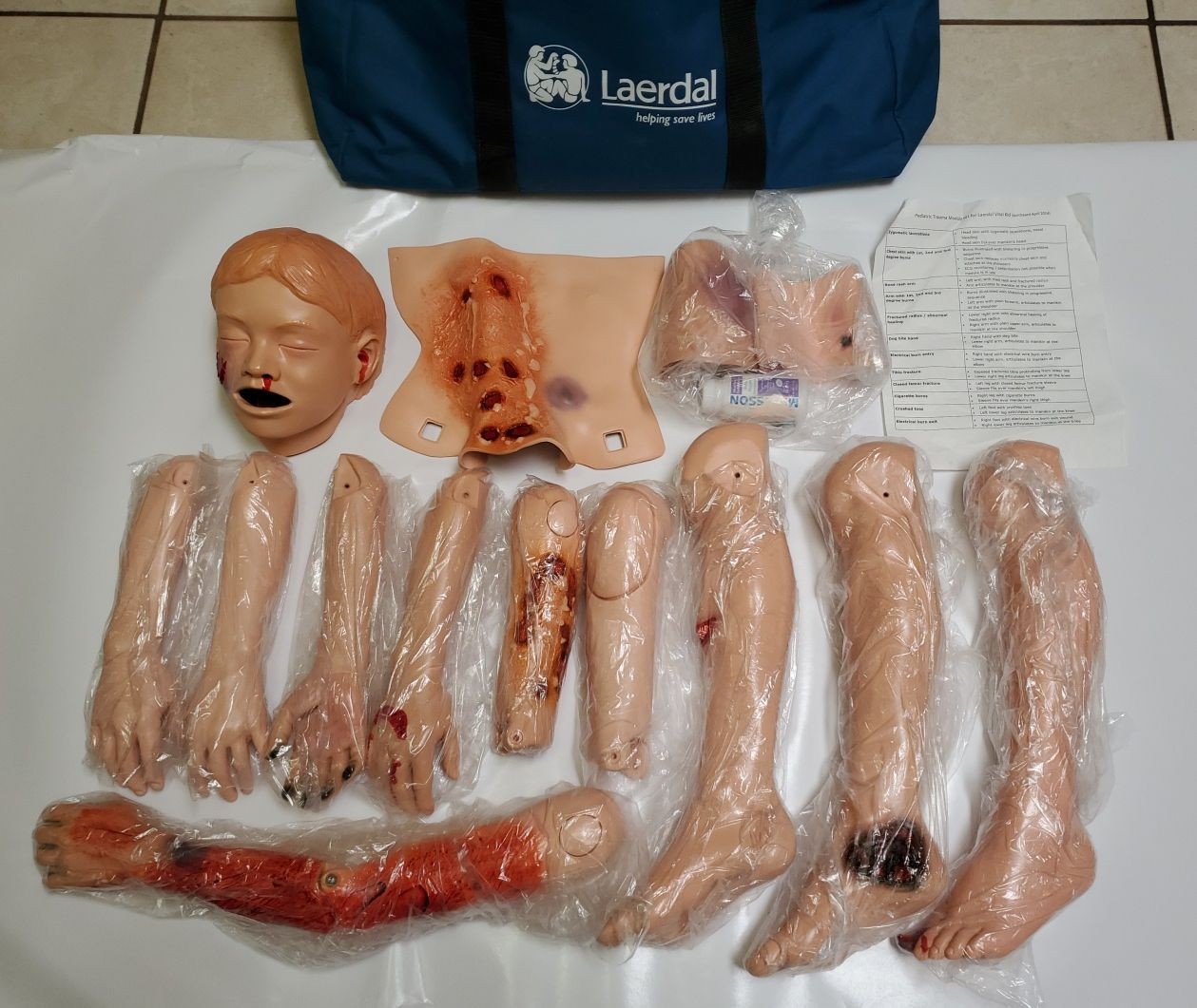 Laerdal Medical Pediatric Trauma Modules Lot of 14 Pieces