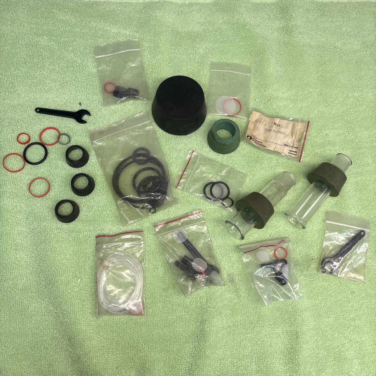 Pharmacia Fine Chemical Miscolanious stoppers,hoses,glassware,etc (All included)